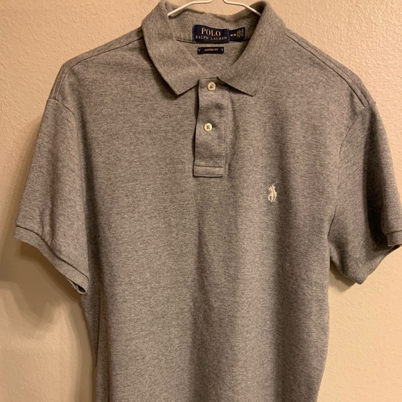 white polo shirt with brown horse